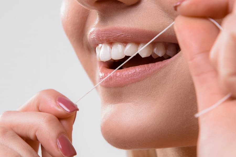 ¿Cómo usar el hilo dental? 12